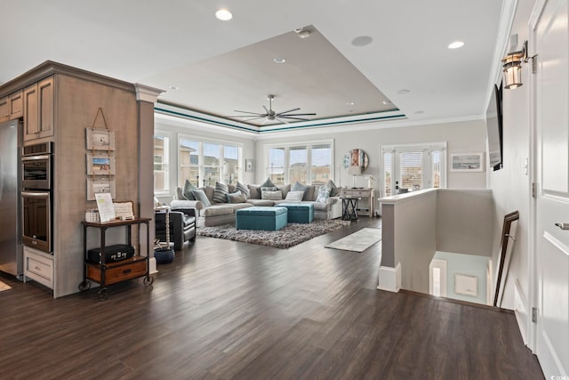 204 33rd Ave N, North Myrtle Beach, SC 29582 - living area featuring dark wood finished floors, a ceiling fan, ornamental molding, recessed lighting, and a tray ceiling