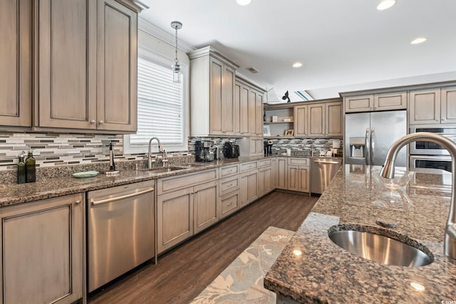 204 33rd Ave N, North Myrtle Beach, SC 29582 - kitchen featuring stainless steel appliances, a sink, open shelves, backsplash, and recessed lighting