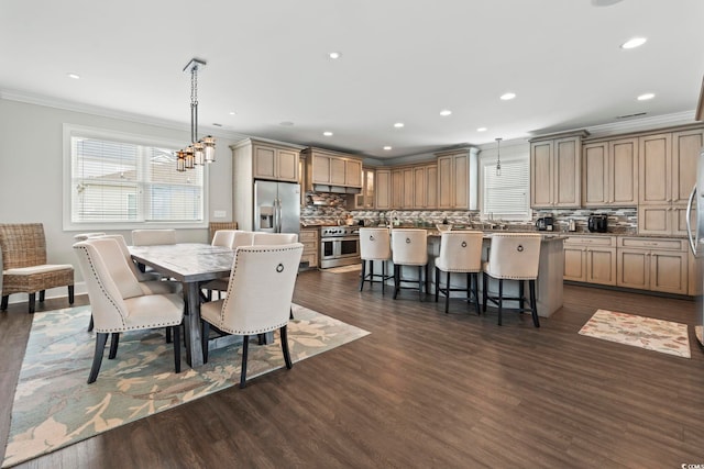 204 33rd Ave N, North Myrtle Beach, SC 29582 - dining room featuring ornamental molding, dark wood-style flooring, recessed lighting, and a chandelier