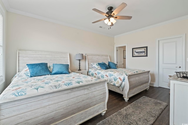 204 33rd Ave N, North Myrtle Beach, SC 29582 - bedroom featuring crown molding, dark wood-type flooring, baseboards, and ceiling fan
