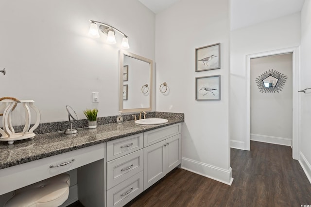 204 33rd Ave N, North Myrtle Beach, SC 29582 - bathroom featuring wood finished floors, baseboards, and vanity