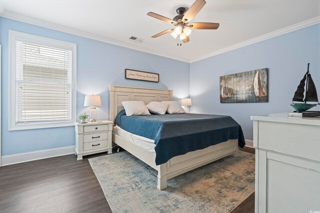 204 33rd Ave N, North Myrtle Beach, SC 29582 - bedroom featuring dark wood finished floors, baseboards, crown molding, and ceiling fan