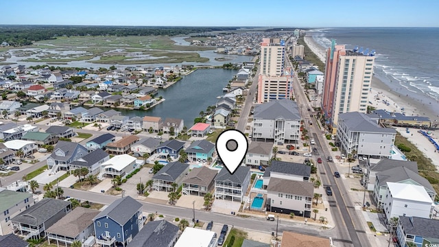 204 33rd Ave N, North Myrtle Beach, SC 29582 - aerial view of property's location featuring a nearby body of water and nearby suburban area