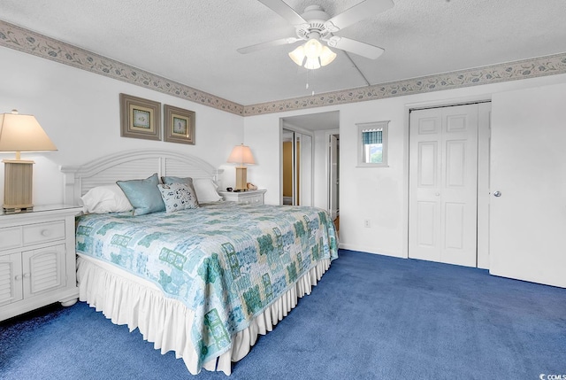 2511 S Ocean Blvd Unit 507G, Myrtle Beach, SC 29577 - bedroom featuring dark colored carpet, a textured ceiling, a ceiling fan, and a closet