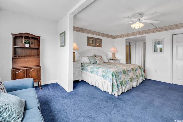 2511 S Ocean Blvd Unit 507G, Myrtle Beach, SC 29577 - bedroom with dark colored carpet, baseboards, ceiling fan, and a textured ceiling