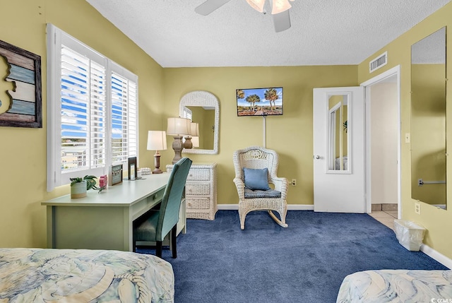 2511 S Ocean Blvd Unit 507G, Myrtle Beach, SC 29577 - carpeted bedroom featuring a textured ceiling, ceiling fan, baseboards, and an office area