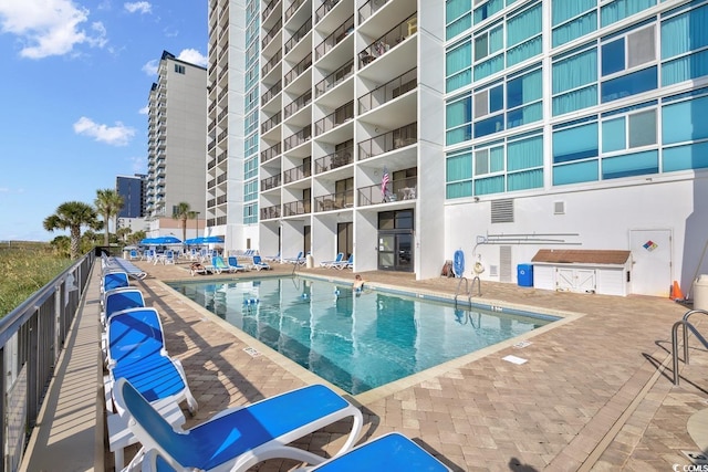 2511 S Ocean Blvd Unit 507G, Myrtle Beach, SC 29577 - community pool featuring a patio area