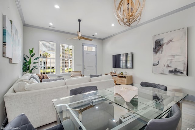 3477 Bristol Ln Unit 3477, Myrtle Beach, SC 29577 - dining space featuring crown molding, recessed lighting, wood finished floors, ceiling fan, and a chandelier