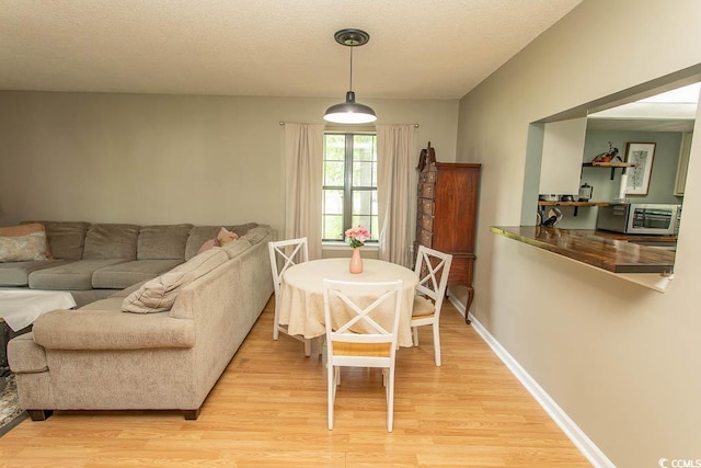 6610 Mallard View Pt, Myrtle Beach, SC 29588 - dining space with light wood-type flooring and baseboards