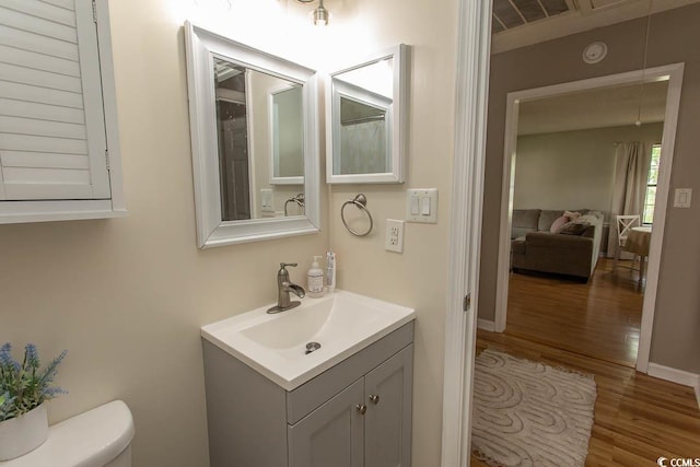 6610 Mallard View Pt, Myrtle Beach, SC 29588 - bathroom with wood finished floors, vanity, and toilet