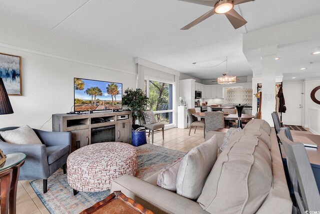 423 Parker Dr Unit 334, Pawleys Island, SC 29585 - living area with light tile patterned floors, ceiling fan, and a chandelier