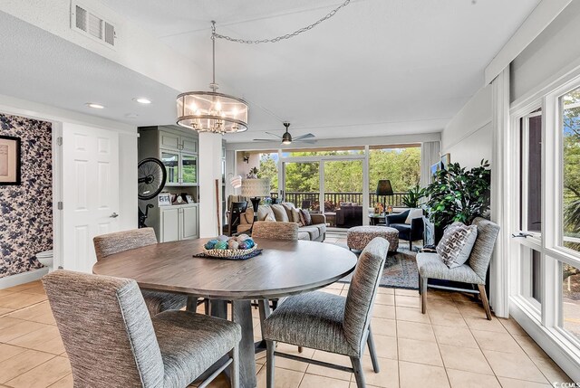 423 Parker Dr Unit 334, Pawleys Island, SC 29585 - dining area with light tile patterned flooring, a chandelier, healthy amount of natural light, and recessed lighting