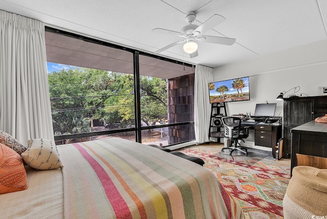 423 Parker Dr Unit 334, Pawleys Island, SC 29585 - bedroom featuring an office area, a ceiling fan, and floor to ceiling windows