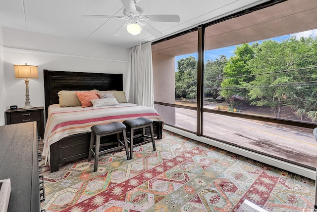 423 Parker Dr Unit 334, Pawleys Island, SC 29585 - bedroom with access to exterior and a ceiling fan