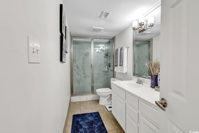 423 Parker Dr Unit 334, Pawleys Island, SC 29585 - bathroom featuring a stall shower, vanity, tile patterned flooring, toilet, and baseboards
