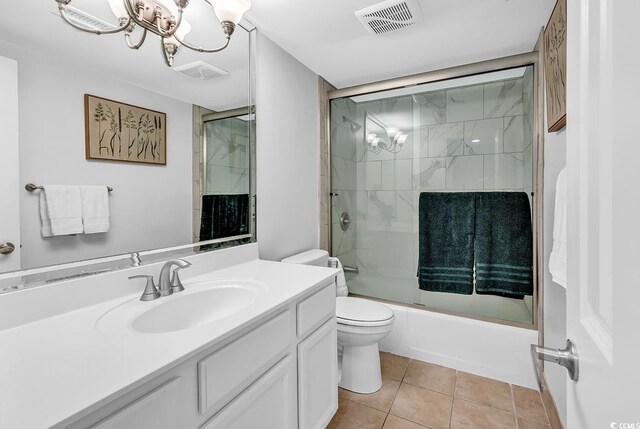 423 Parker Dr Unit 334, Pawleys Island, SC 29585 - bathroom with vanity, toilet, bath / shower combo with glass door, a chandelier, and tile patterned flooring