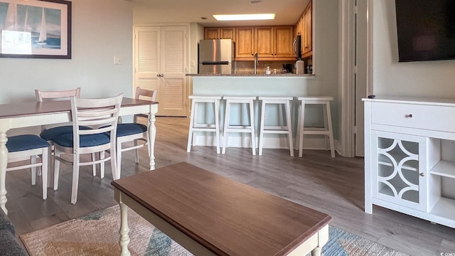 7100 N Ocean Blvd Unit 316, Myrtle Beach, SC 29572 - dining area with light wood-type flooring