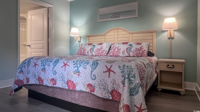 7100 N Ocean Blvd Unit 316, Myrtle Beach, SC 29572 - bedroom with wood finished floors and baseboards