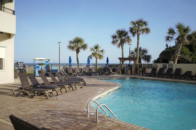 7100 N Ocean Blvd Unit 316, Myrtle Beach, SC 29572 - community pool with a patio