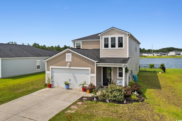 196 Cypress Tree Loop, Longs, SC 29568 - view of front of home with an attached garage, driveway, board and batten siding, a water view, and a shingled roof