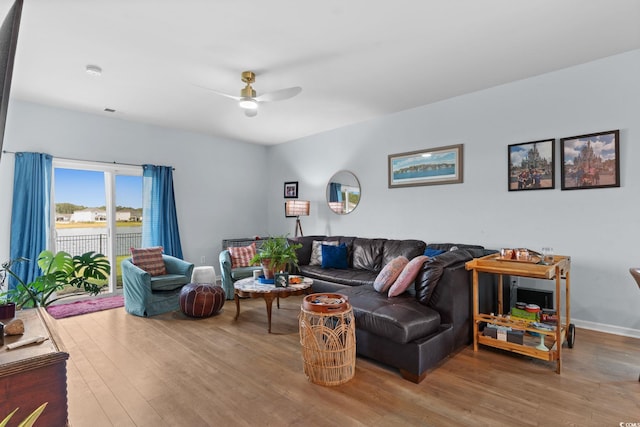 196 Cypress Tree Loop, Longs, SC 29568 - living area featuring a ceiling fan, wood finished floors, and baseboards