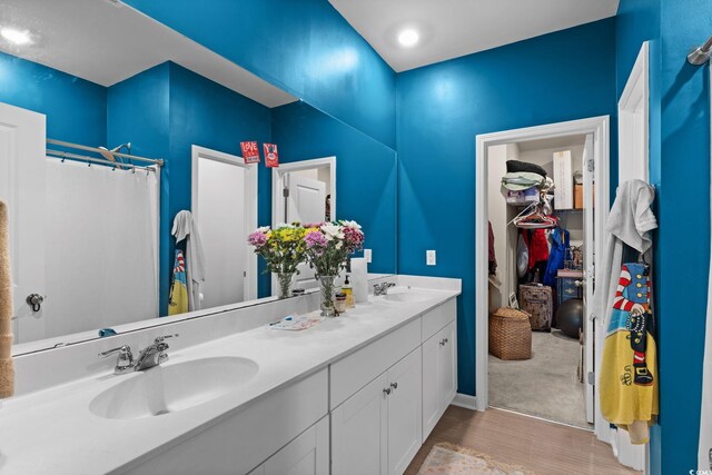 196 Cypress Tree Loop, Longs, SC 29568 - bathroom with double vanity and curtained shower