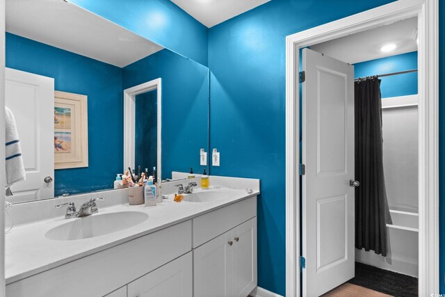 196 Cypress Tree Loop, Longs, SC 29568 - full bath featuring double vanity and wood finished floors