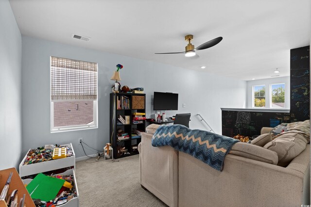 196 Cypress Tree Loop, Longs, SC 29568 - carpeted living room with ceiling fan and baseboards