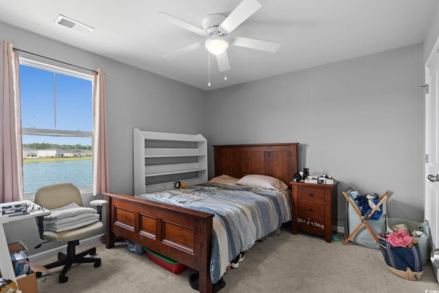 196 Cypress Tree Loop, Longs, SC 29568 - bedroom with carpet flooring, a water view, and ceiling fan