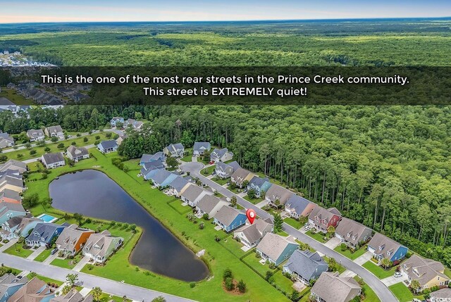 1227 Cypress Shadow Ct, Murrells Inlet, SC 29576 - aerial view of property's location with a heavily wooded area, a nearby body of water, and nearby suburban area