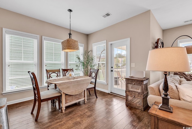 1227 Cypress Shadow Ct, Murrells Inlet, SC 29576 - dining area featuring dark wood-style floors and baseboards