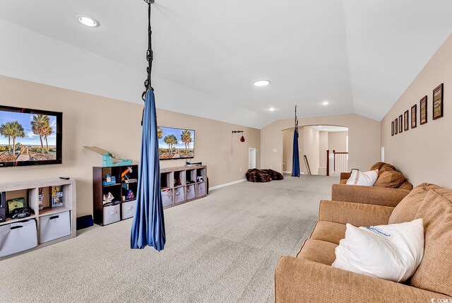 1227 Cypress Shadow Ct, Murrells Inlet, SC 29576 - carpeted living area featuring vaulted ceiling, arched walkways, recessed lighting, and baseboards
