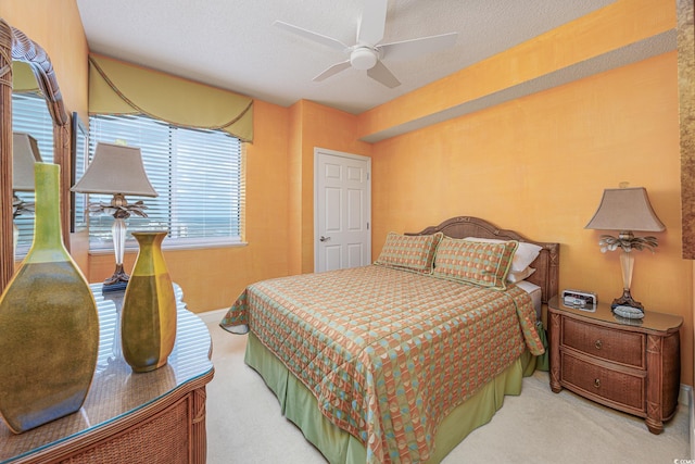 5700 N Ocean Blvd Unit Ph12, North Myrtle Beach, SC 29582 - carpeted bedroom featuring a ceiling fan, baseboards, and a textured ceiling