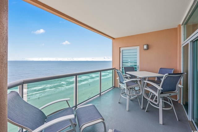 5700 N Ocean Blvd Unit Ph12, North Myrtle Beach, SC 29582 - balcony featuring a water view and outdoor dining space