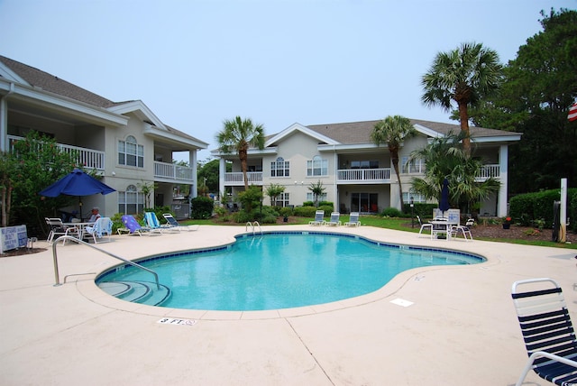 390 Lands End Blvd Unit 4-201, Myrtle Beach, SC 29572 - community pool with a patio
