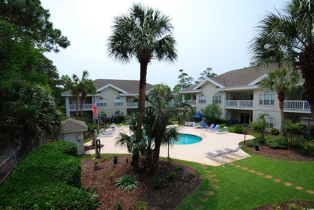 390 Lands End Blvd Unit 4-201, Myrtle Beach, SC 29572 - community pool featuring a patio