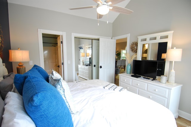 390 Lands End Blvd Unit 4-201, Myrtle Beach, SC 29572 - bedroom with light wood-style floors, baseboards, ceiling fan, high vaulted ceiling, and a closet