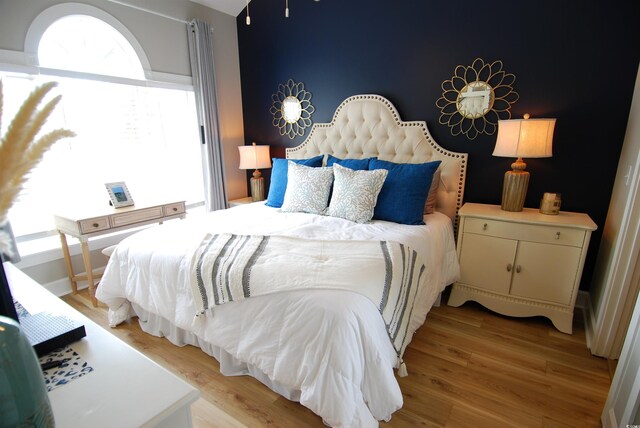 390 Lands End Blvd Unit 4-201, Myrtle Beach, SC 29572 - bedroom with light wood finished floors