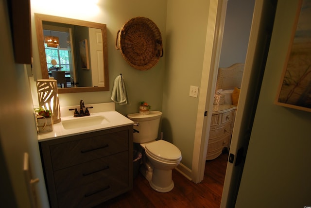 390 Lands End Blvd Unit 4-201, Myrtle Beach, SC 29572 - bathroom with wood finished floors, vanity, and toilet