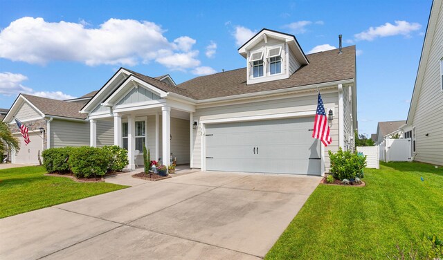 765 Berkshire Ave, Myrtle Beach, SC 29577 - view of front facade featuring driveway, an attached garage, and a shingled roof