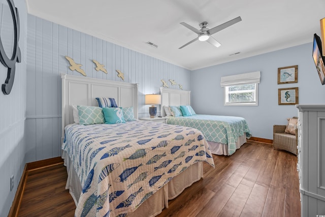 1705 N Ocean Blvd N, North Myrtle Beach, SC 29582 - bedroom featuring dark wood-type flooring, baseboards, ceiling fan, and ornamental molding