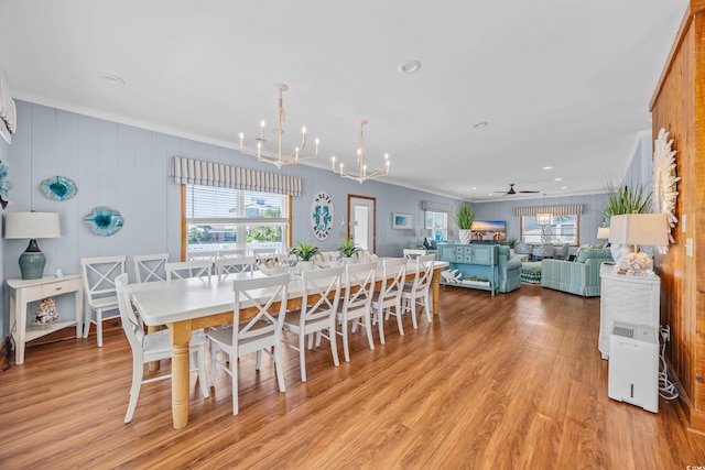 1705 N Ocean Blvd N, North Myrtle Beach, SC 29582 - dining space with a chandelier, crown molding, light wood-style flooring, and recessed lighting