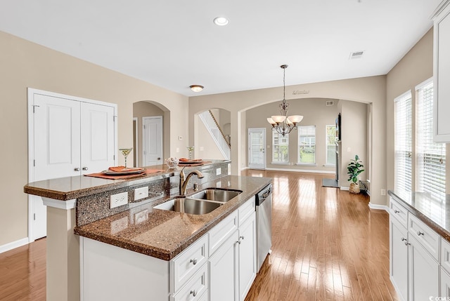 126 Dreamland Dr, Murrells Inlet, SC 29576 - kitchen with a sink, dishwasher, a kitchen island with sink, a chandelier, and light wood-type flooring