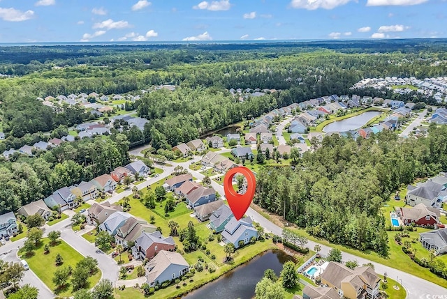 126 Dreamland Dr, Murrells Inlet, SC 29576 - aerial view of property and surrounding area featuring nearby suburban area, a nearby body of water, and a heavily wooded area