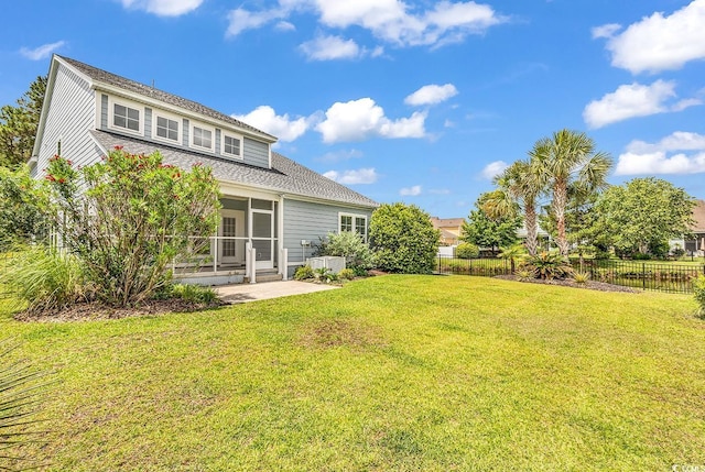 126 Dreamland Dr, Murrells Inlet, SC 29576 - back of house with a patio, a sunroom, and a shingled roof