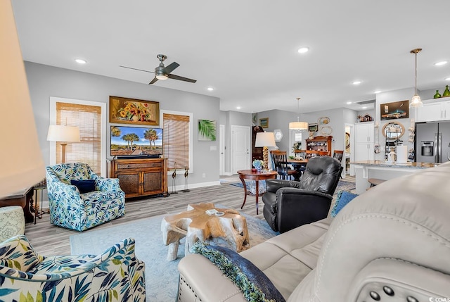 601 46th Ave S, North Myrtle Beach, SC 29582 - living area with light wood-type flooring, a ceiling fan, baseboards, recessed lighting, and healthy amount of natural light