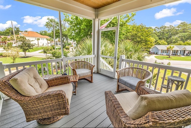 601 46th Ave S, North Myrtle Beach, SC 29582 - wooden porch featuring a residential view