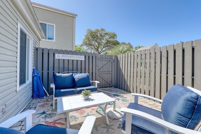 800 S 9th Ave S Unit A-1, North Myrtle Beach, SC 29582 - view of patio with a gate and an outdoor living space
