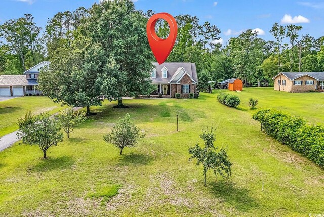 6161 Inman Cir, Conway, SC 29526 - view of grassy yard featuring a porch