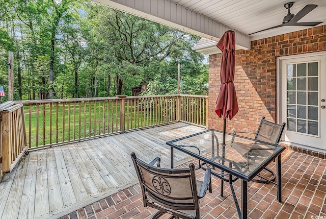 6161 Inman Cir, Conway, SC 29526 - wooden terrace featuring a ceiling fan, a lawn, and outdoor dining area